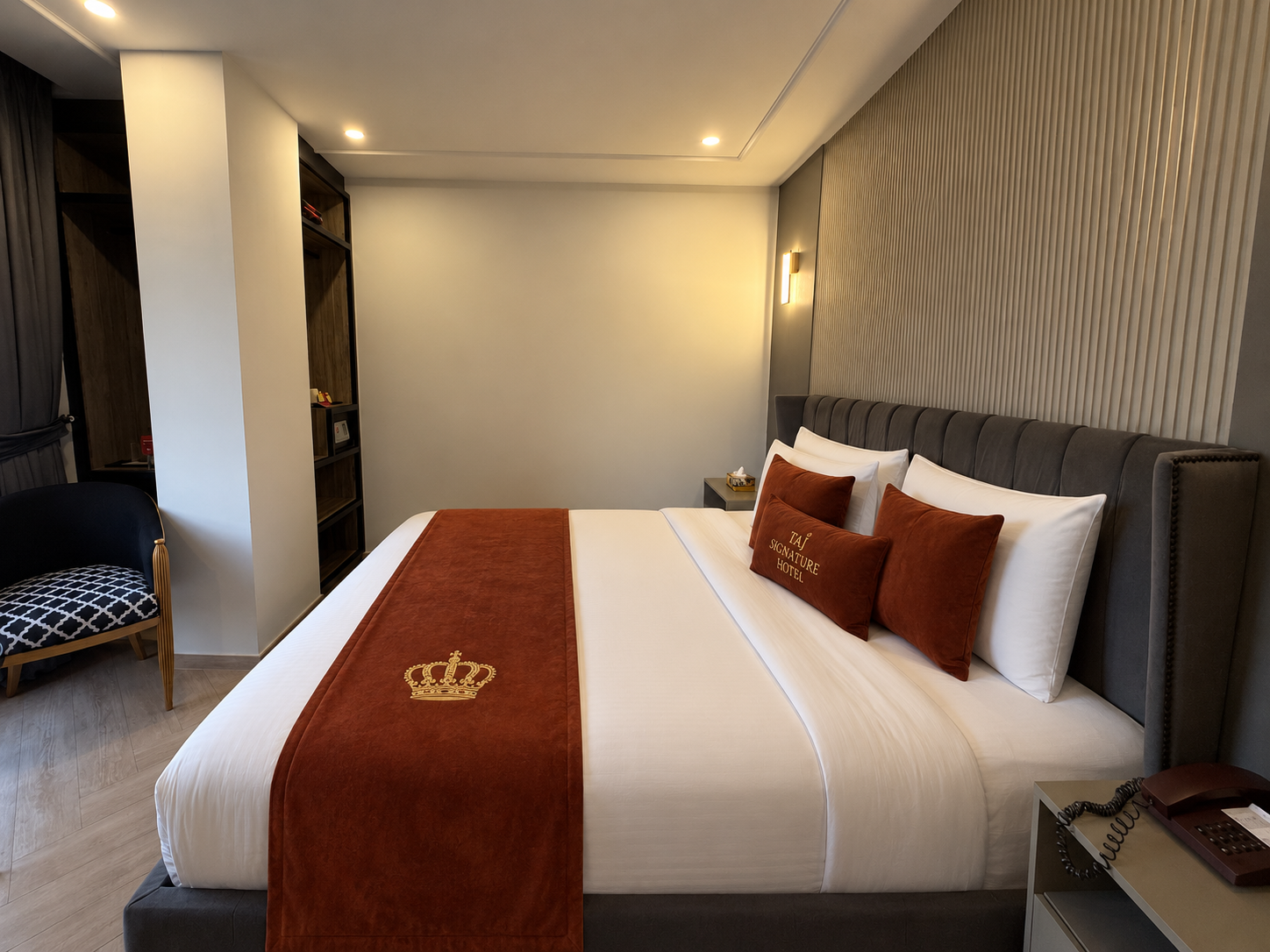 Guest room with signature bordeaux runner at Taj Signature Hotel Islamabad